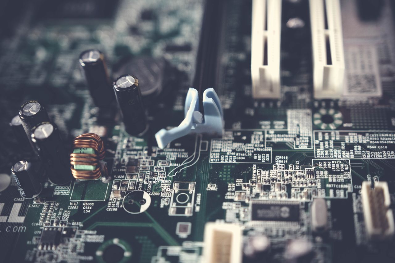 Crafting Captivating Headlines: Your awesome post title goes here Detailed view of components on a computer motherboard, showcasing technology and circuitry.